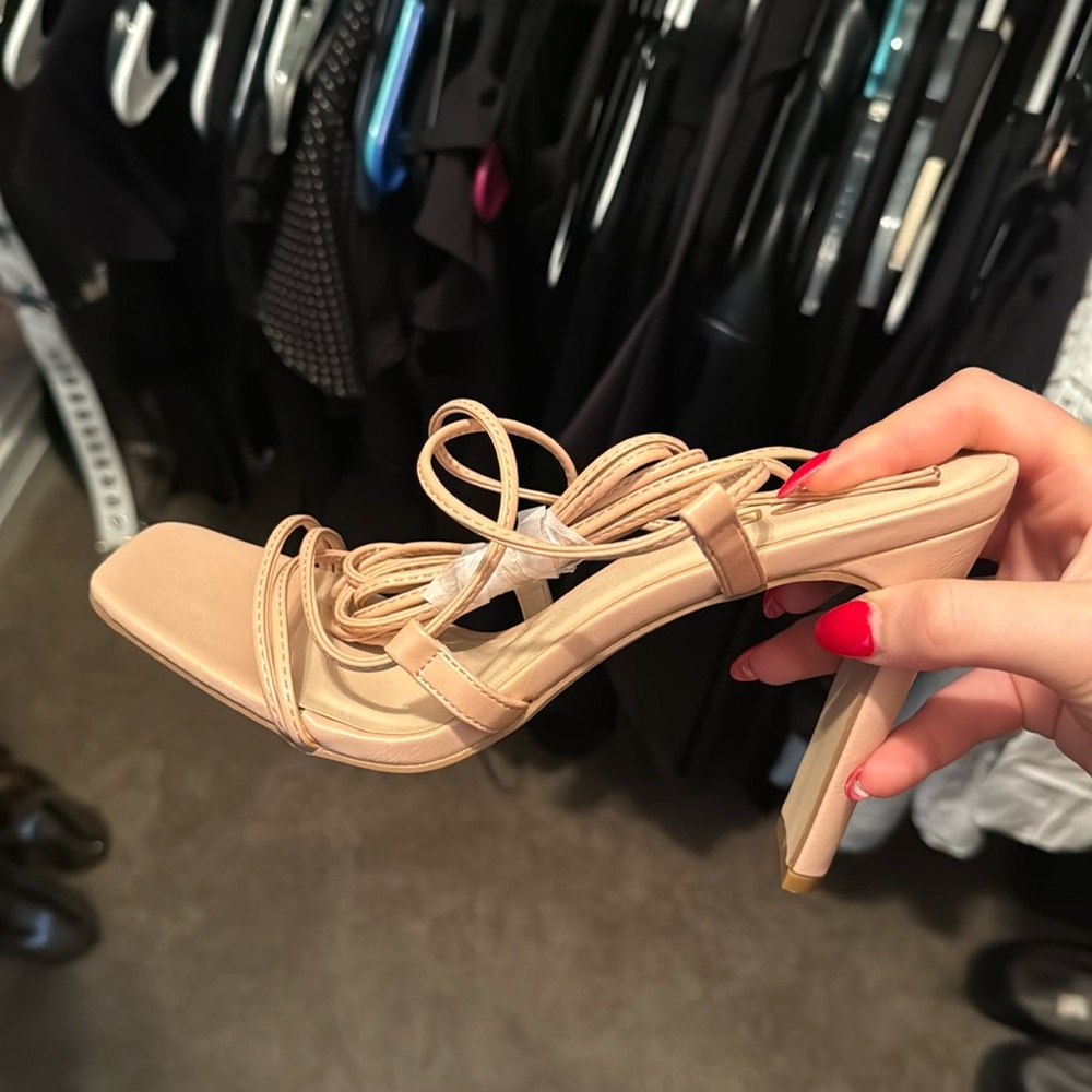 Tan lace up heel never worn